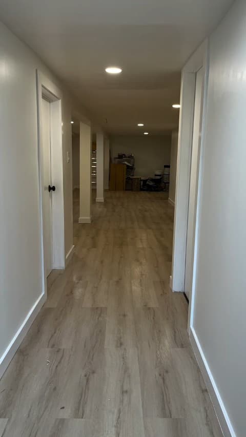 Hallway with wood-look vinyl flooring
